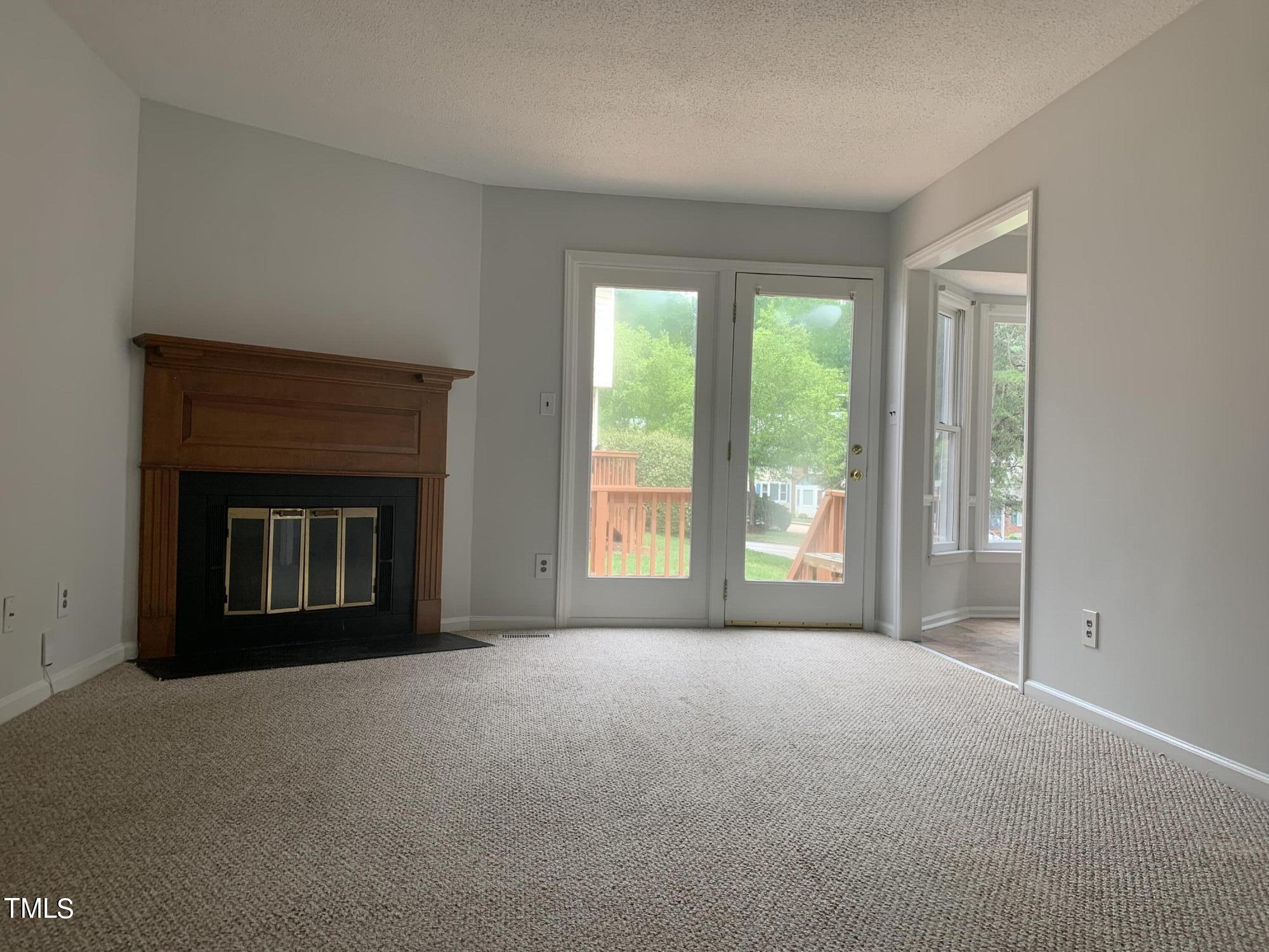 4117 Kaplan Drive Raleigh, NC 27606 - Photo 10 of 21 familyroomfpnew