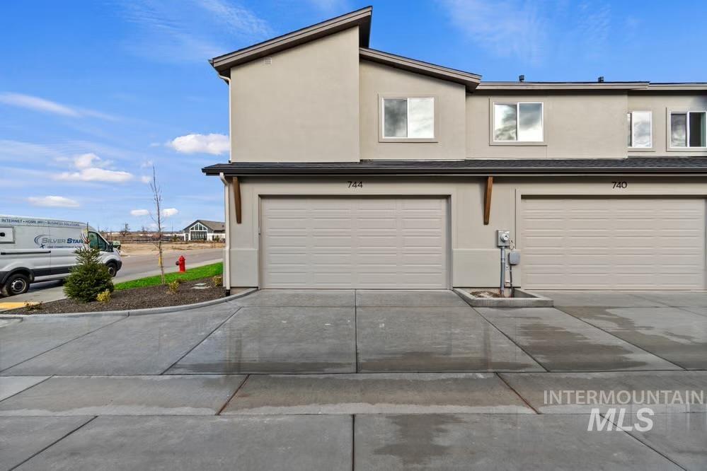 744 South Calhoun Lane Star, ID 83669 - Photo 18 of 34 Garage with concrete driveway