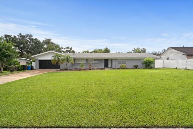 a house view with a garden space
