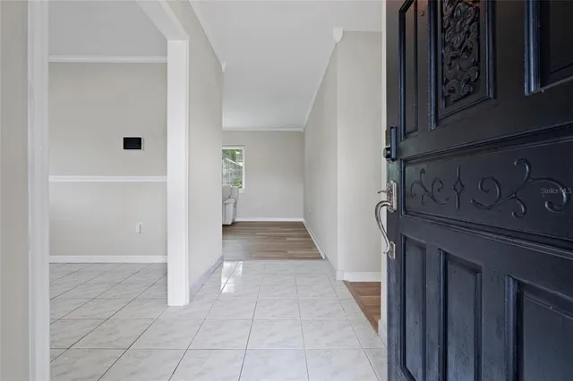 a view of a hallway with closet