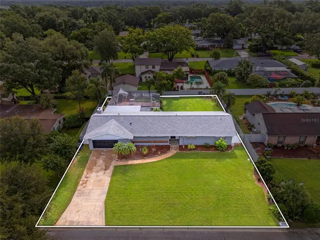 an aerial view of a pool