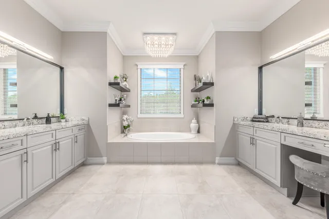 a bathroom with a shower sink and mirror