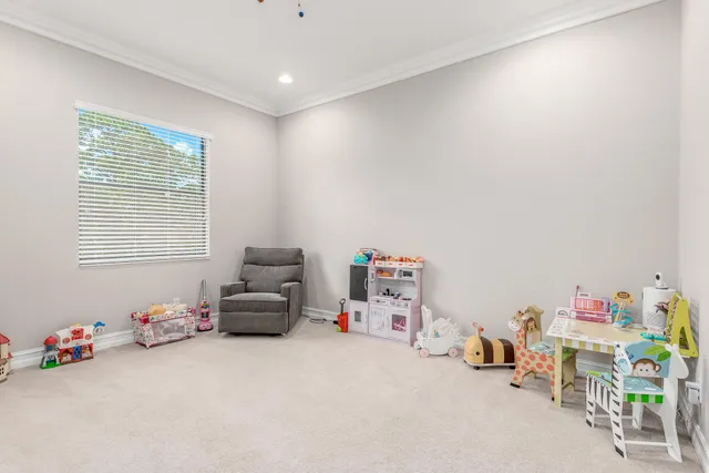 a bathroom with a double vanity sink toilet and shower