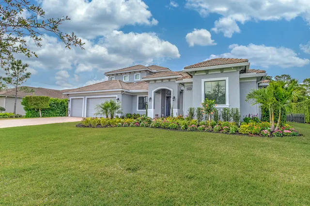 a view of swimming pool and trees in the background
