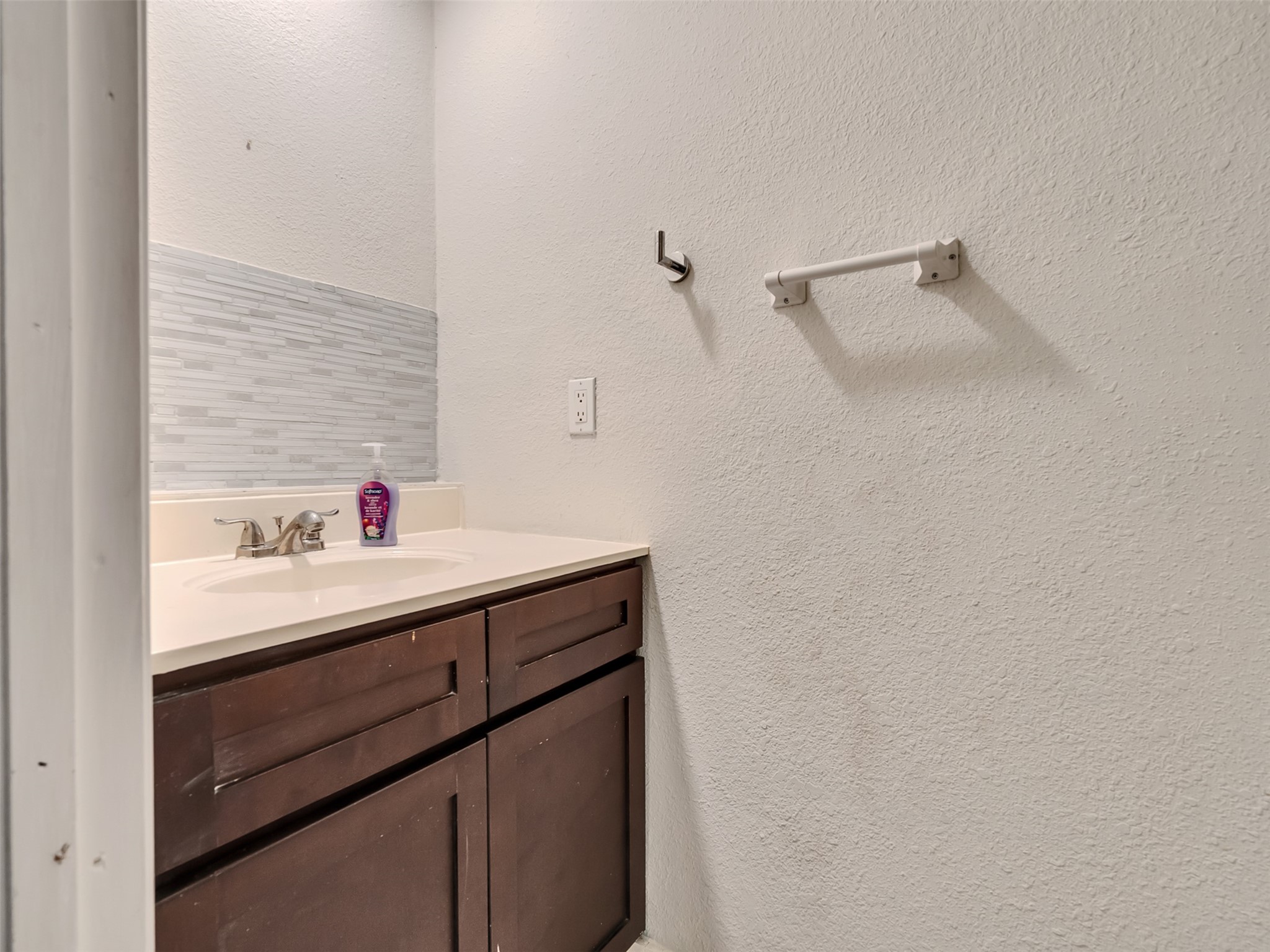 137 County Road 5023 Cleveland, TX 77327 - Photo 41 of 49 a bathroom with a sink and a toilet