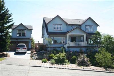 121 Northwest 46th Street Seattle, WA 98107 - Photo 1 of 1 a front view of a house with garden