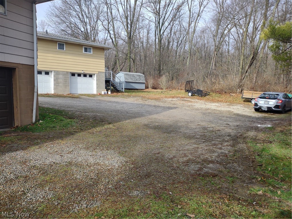 342 Diane Street Rittman, OH 44270 - Photo 17 of 17 View of yard with a garage