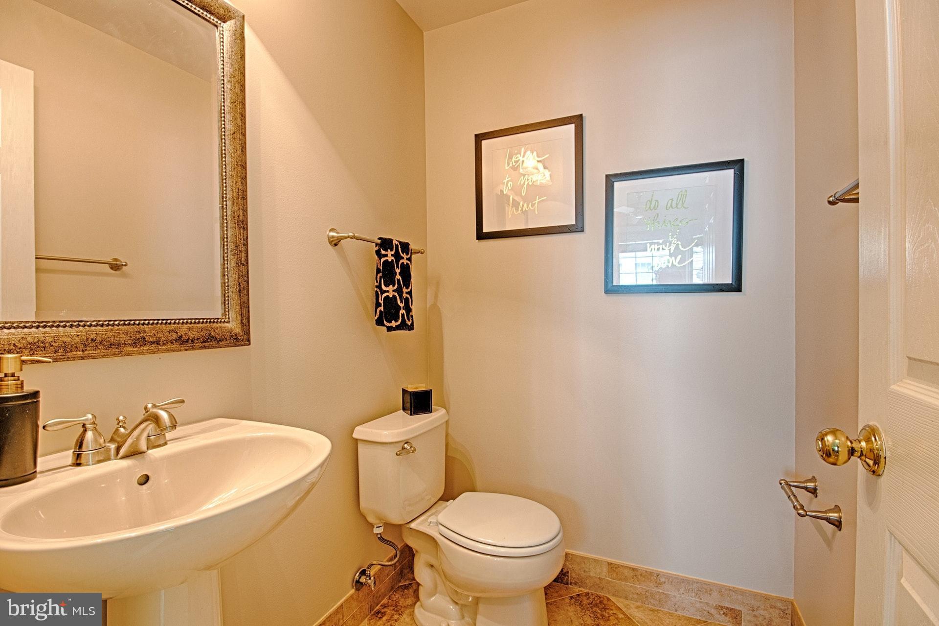 1217 Wild Hawthorn Way Reston, VA 20194 - Photo 16 of 30 Main Level half bath