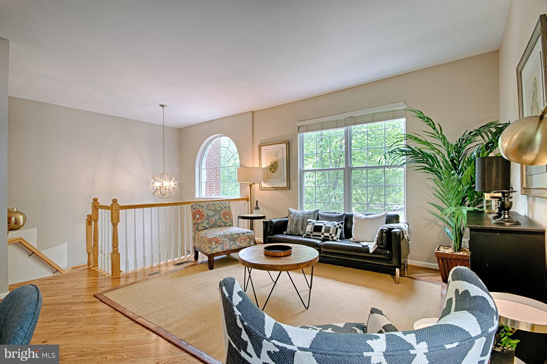 1217 Wild Hawthorn Way Reston, VA 20194 - Photo 8 of 30 Living Room with 2-story foyer