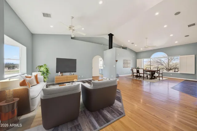 a kitchen with stainless steel appliances granite countertop a stove and a refrigerator