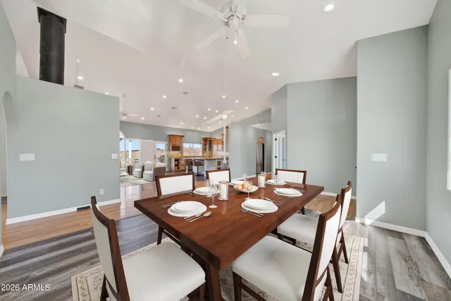 a view of a kitchen counter top a sink and glass window