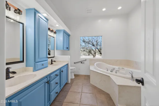 a view of a hallway to a bedroom