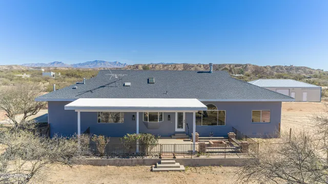 a view of balcony with couch and wooden floor
