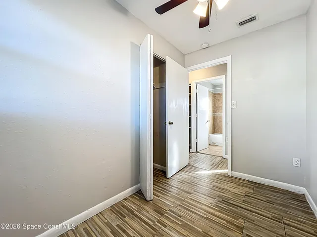 a bathroom with a toilet a sink and bathtub
