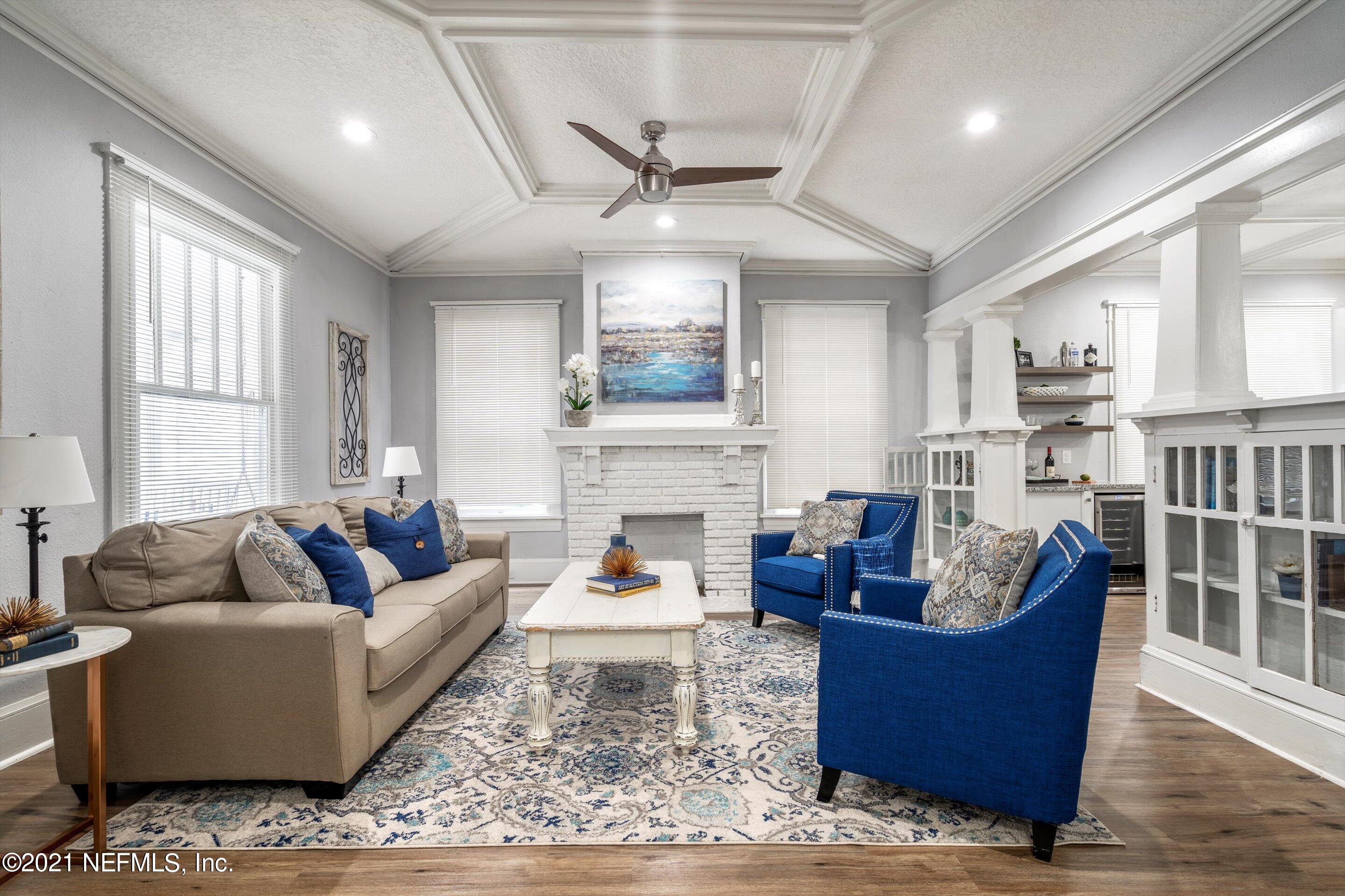 310 West 10th Street Jacksonville, FL 32206 - Photo 10 of 34 a living room with fireplace furniture and a rug