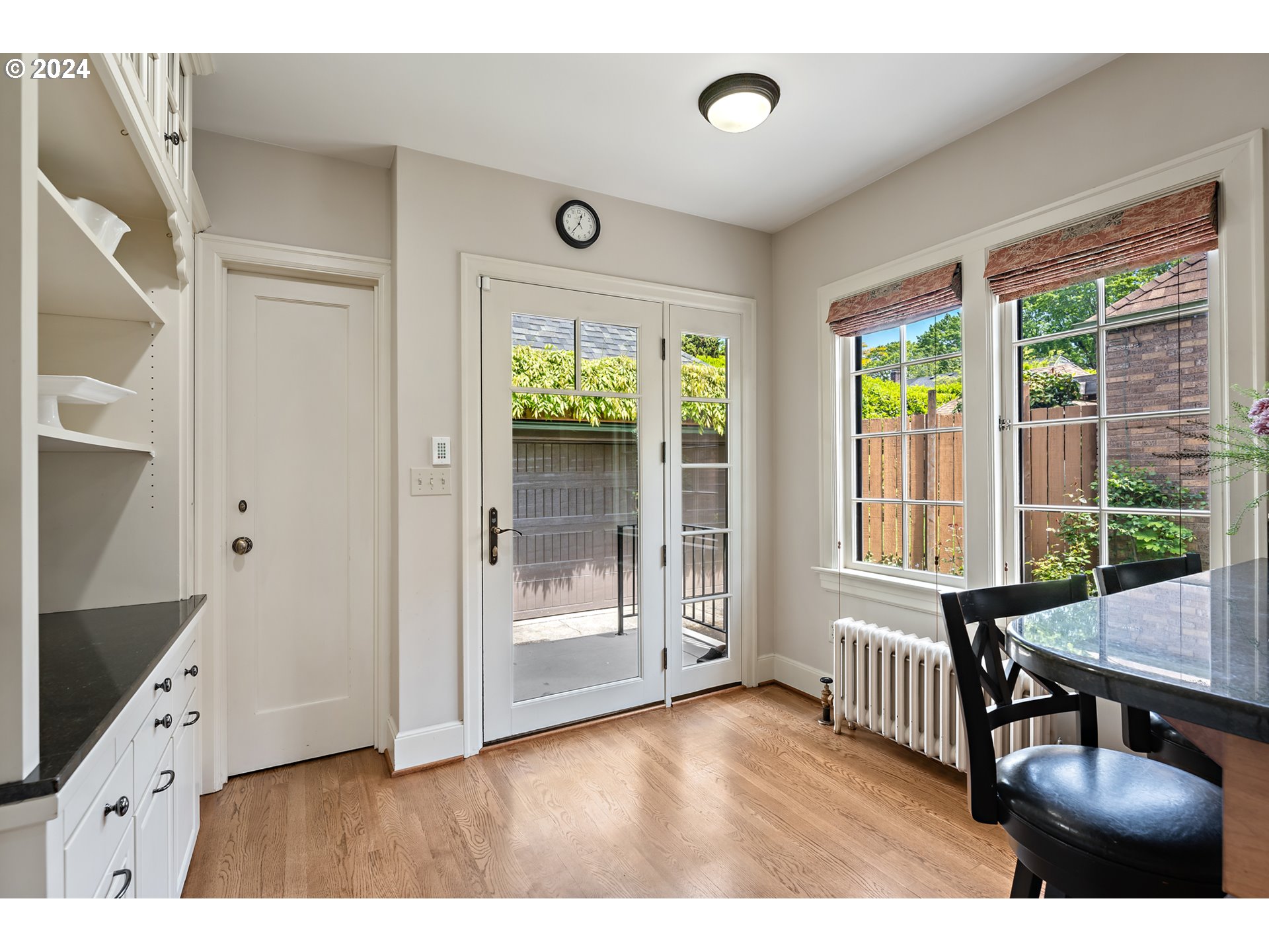 3433 Southeast Henry Street Portland, OR 97202 - Photo 17 of 48 a living room with furniture and two windows