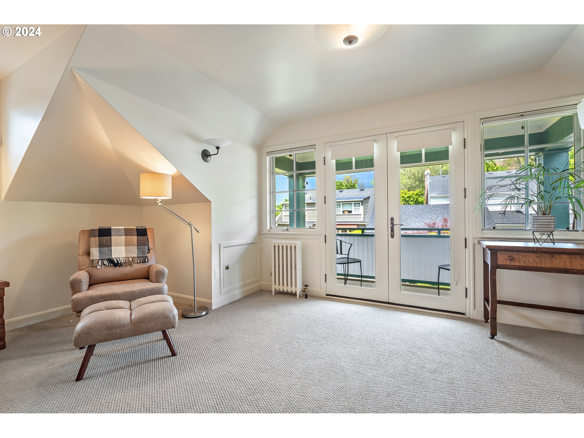3433 Southeast Henry Street Portland, OR 97202 - Photo 20 of 48 a living room with furniture and a large window
