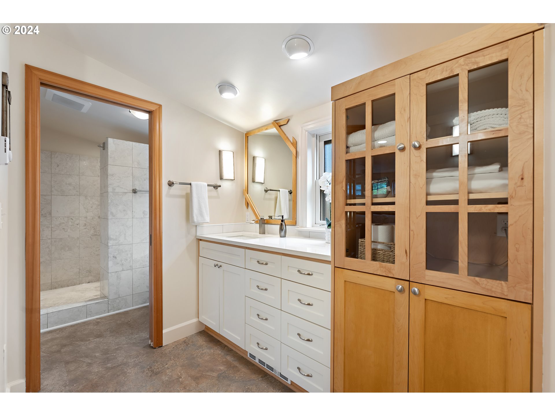 3433 Southeast Henry Street Portland, OR 97202 - Photo 23 of 48 a bathroom with a granite countertop sink mirror and double