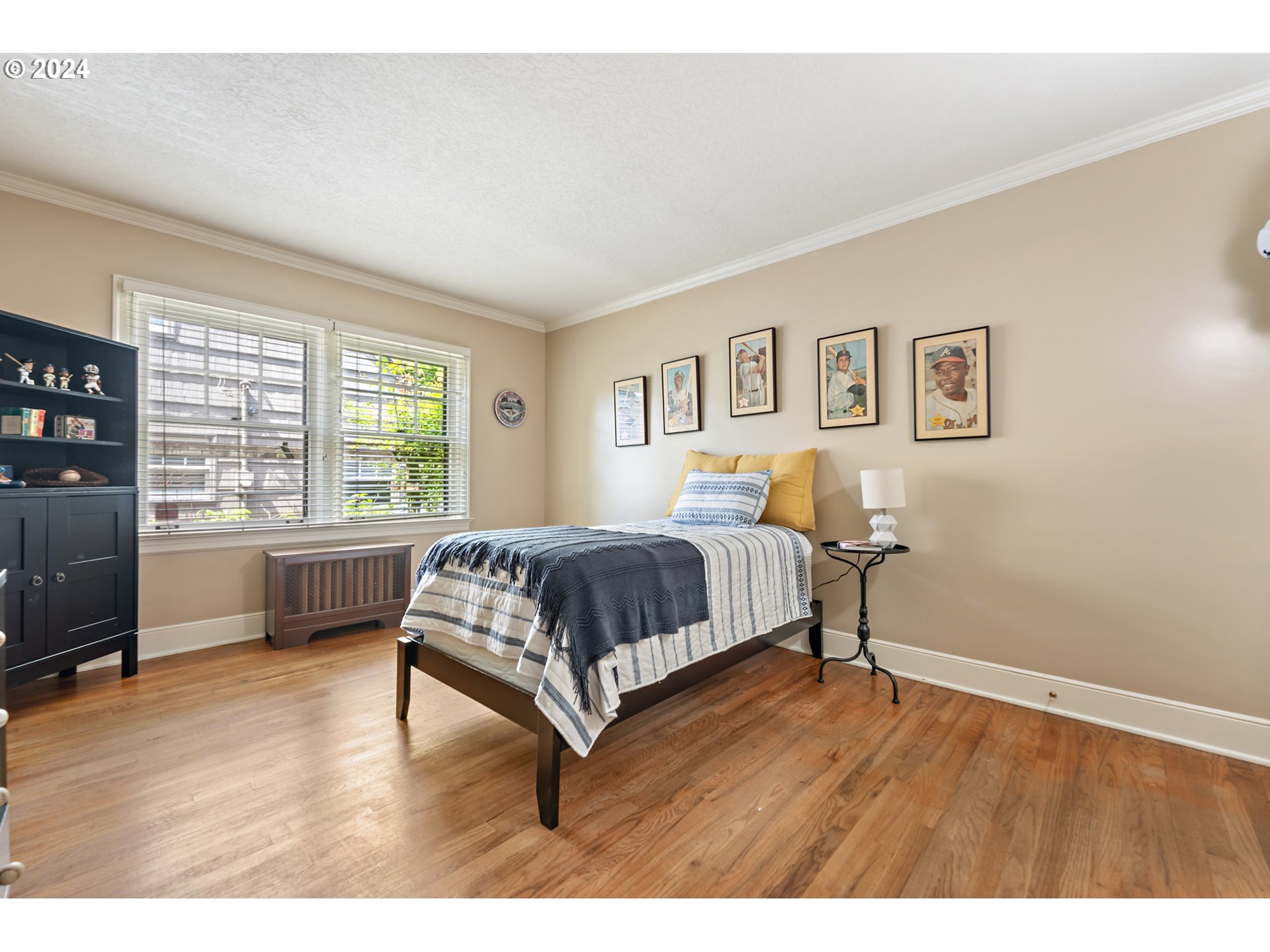 3433 Southeast Henry Street Portland, OR 97202 - Photo 28 of 48 a bedroom with a bed window and a table