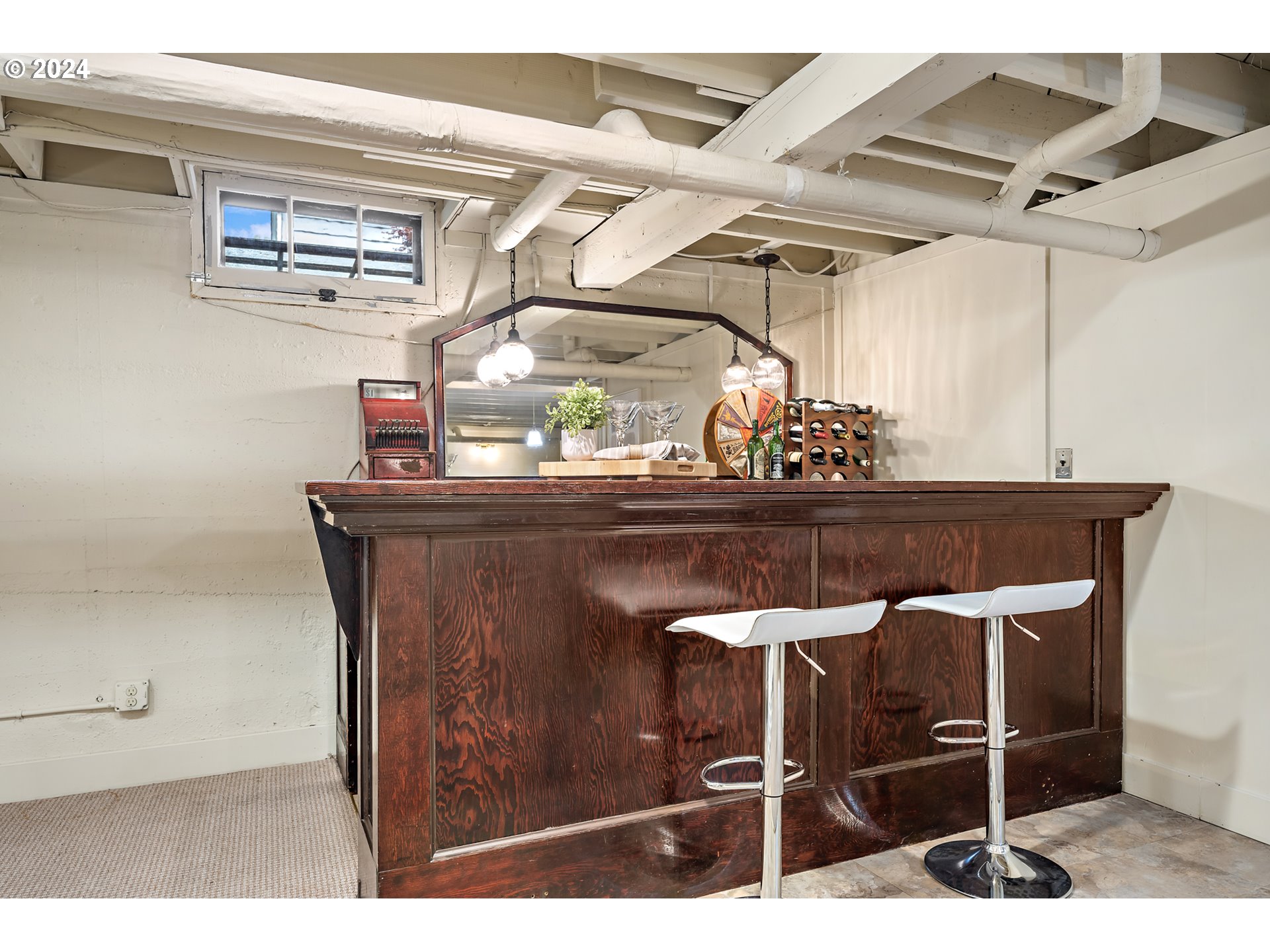 3433 Southeast Henry Street Portland, OR 97202 - Photo 33 of 48 a dining table with chairs and a table