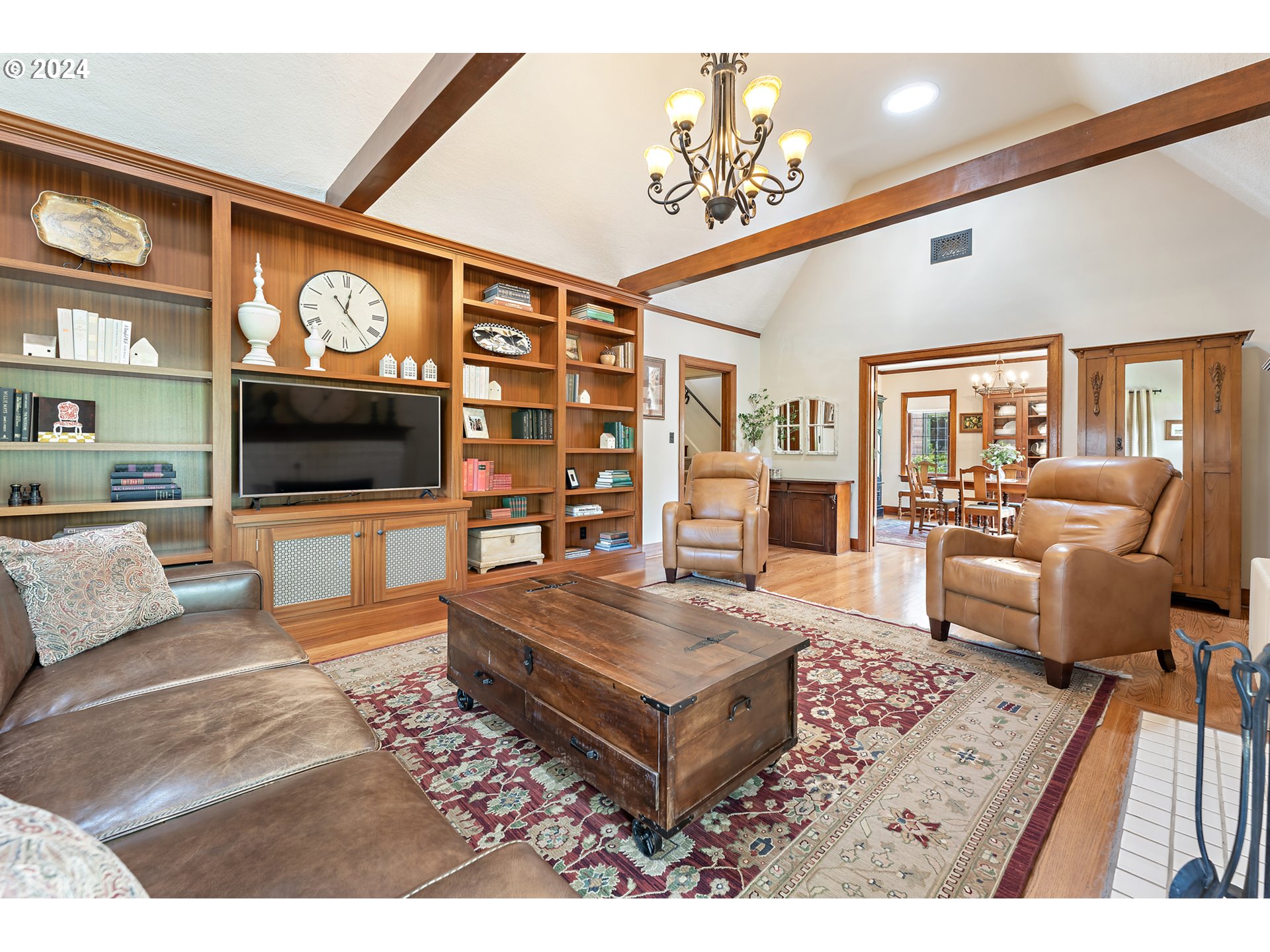 3433 Southeast Henry Street Portland, OR 97202 - Photo 7 of 48 a living room with furniture and a flat screen tv