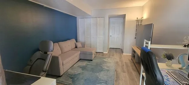 a bathroom with a sink toilet and mirror