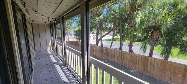 a view of a swimming pool with lounge chair