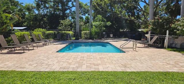 a bird view of house with a yard