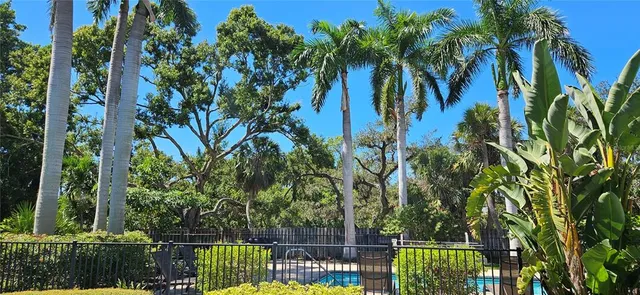 a view of a building with street sign