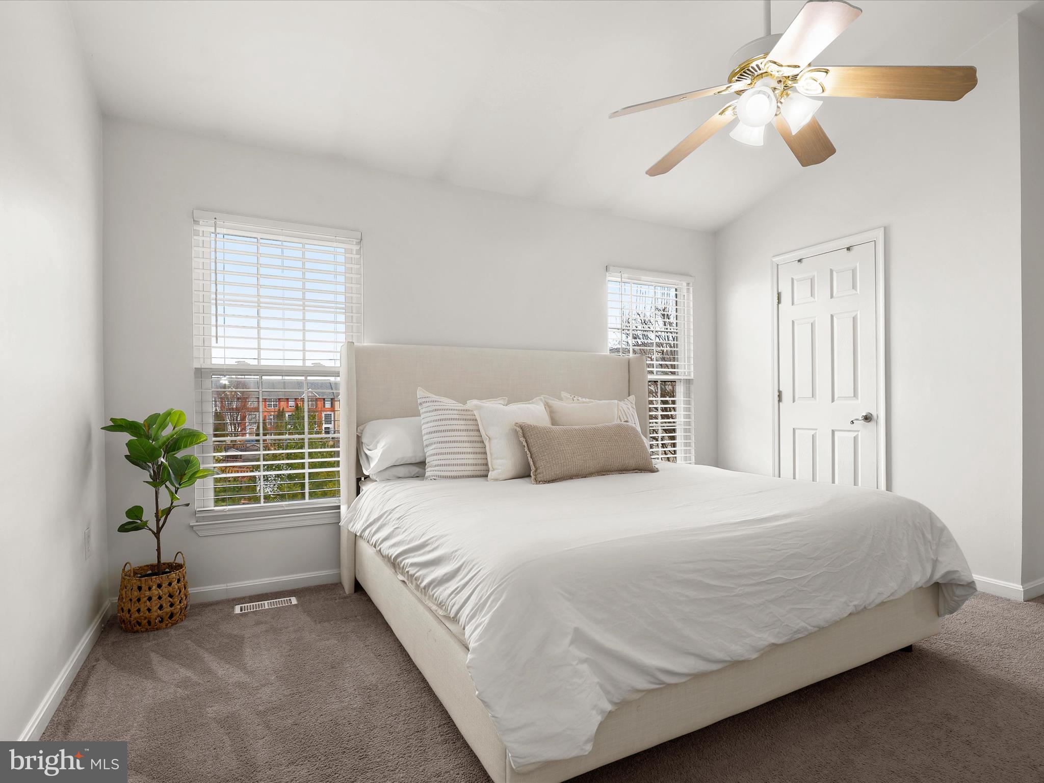174 Harpers Way Frederick, MD 21702 - Photo 18 of 56 a bedroom with a bed and a chandelier