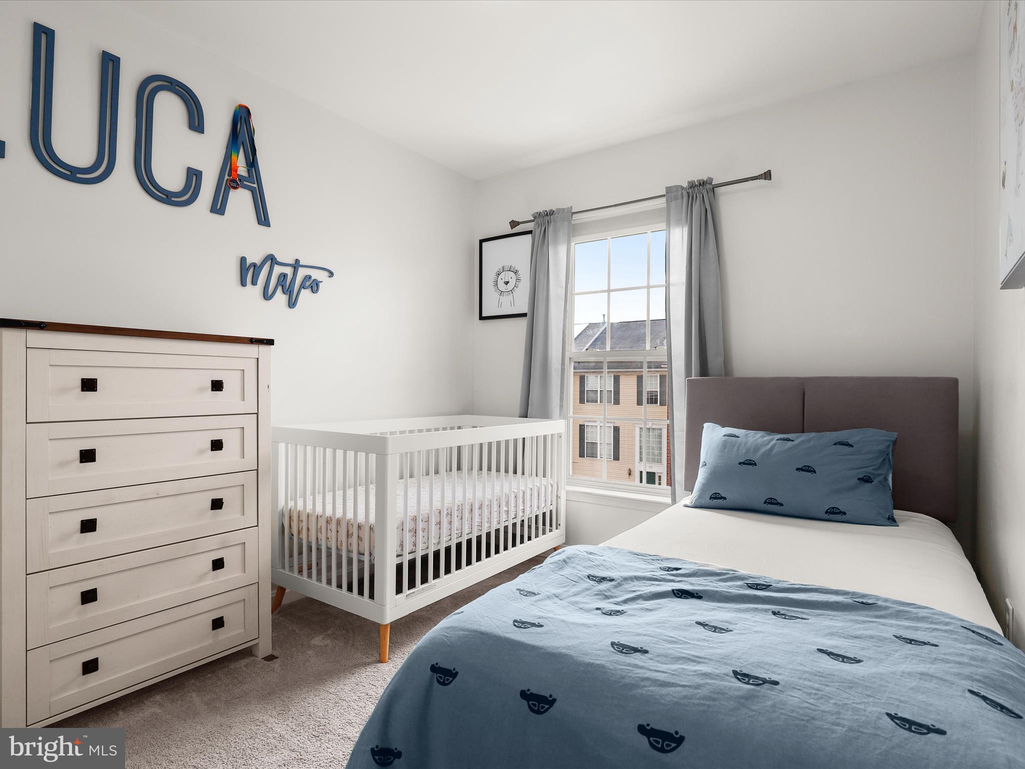174 Harpers Way Frederick, MD 21702 - Photo 21 of 56 a bedroom with a bed and a window