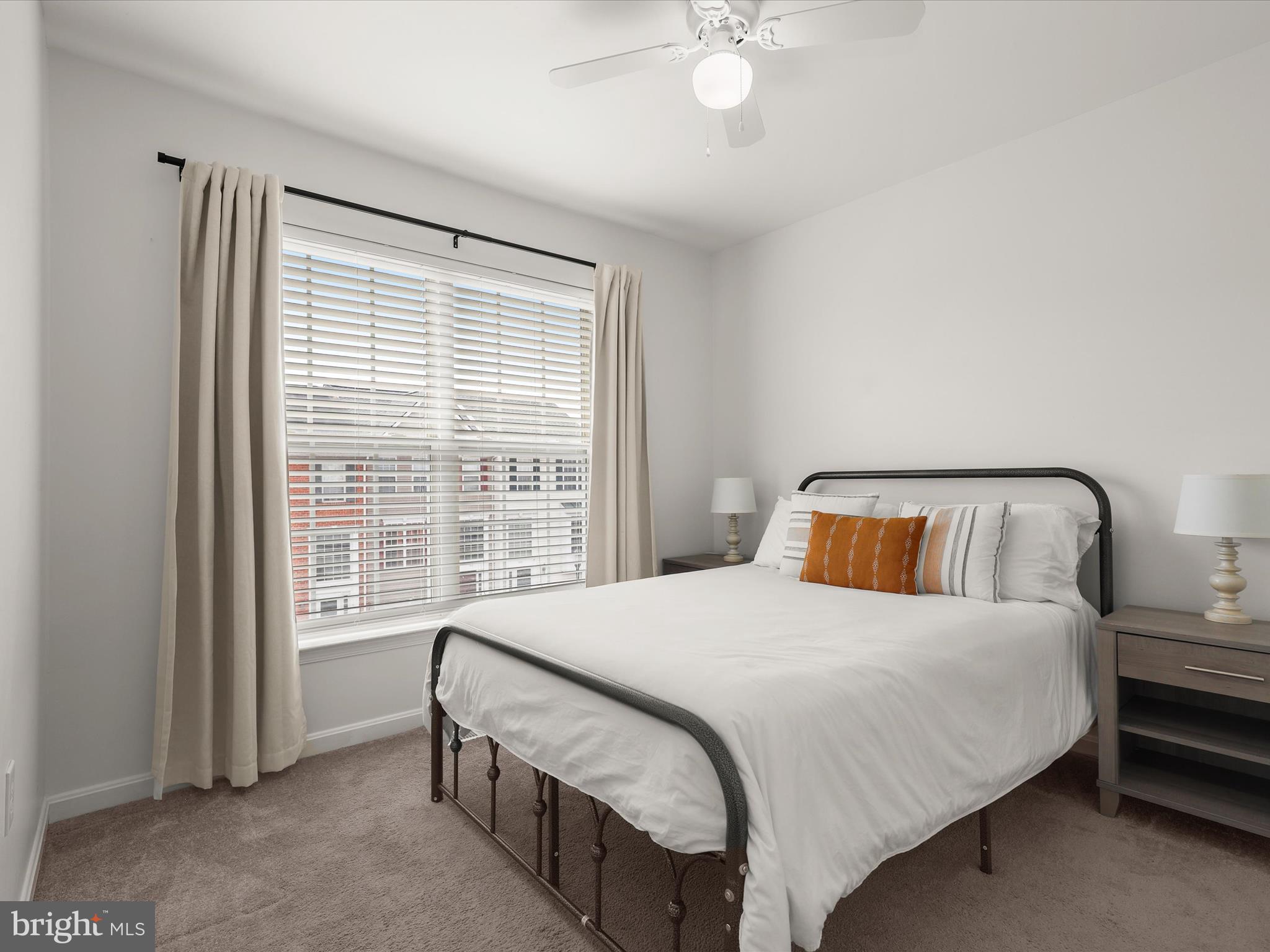 174 Harpers Way Frederick, MD 21702 - Photo 24 of 56 a bedroom with a bed and a large window