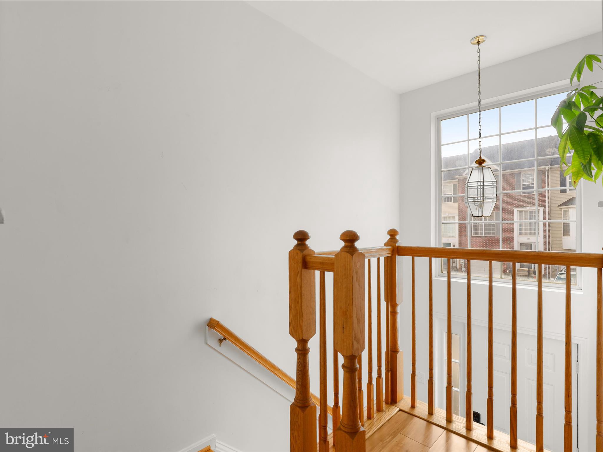 174 Harpers Way Frederick, MD 21702 - Photo 29 of 56 a view of entryway with wooden floor