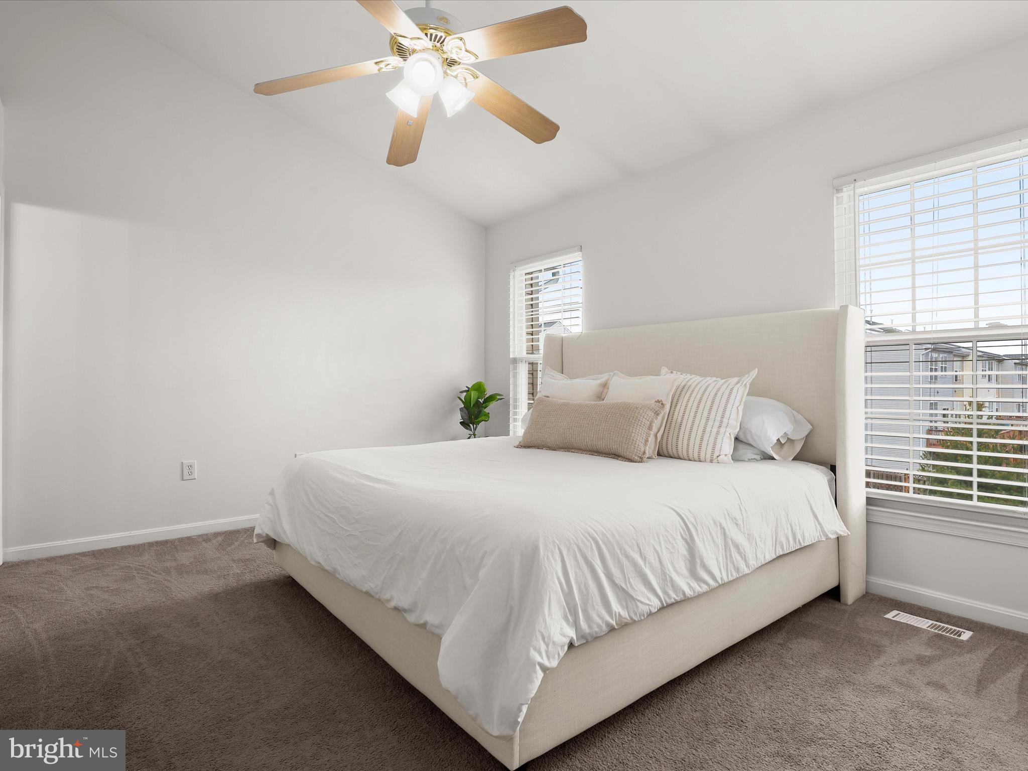 174 Harpers Way Frederick, MD 21702 - Photo 5 of 56 a bedroom with a bed and window