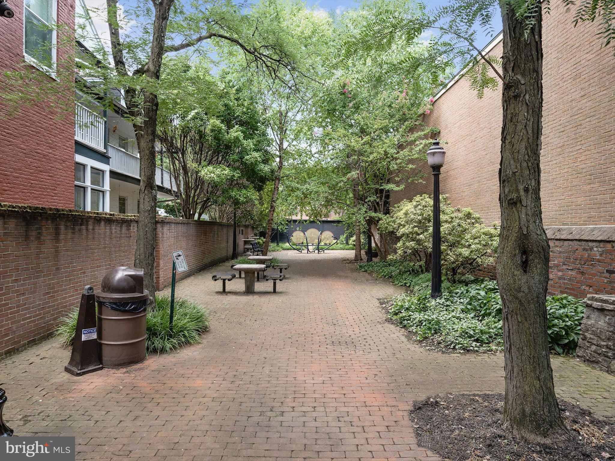 174 Harpers Way Frederick, MD 21702 - Photo 53 of 56 a view of backyard with outdoor seating and trees