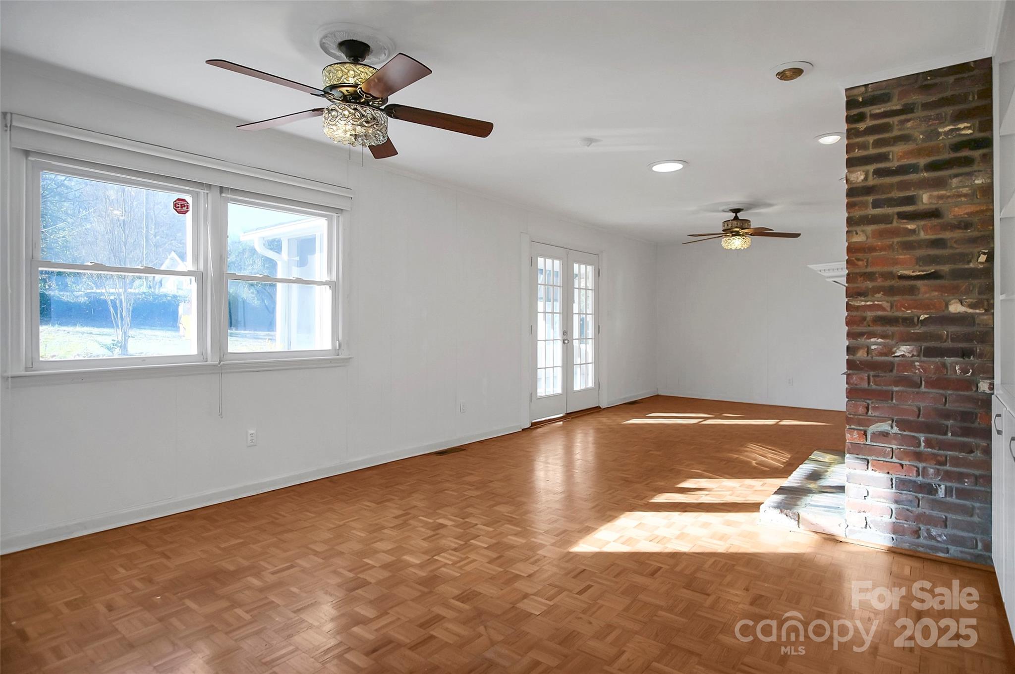1925 Montclair Avenue Gastonia, NC 28054 - Photo 18 of 35 a view of empty room with a window and ceiling fan