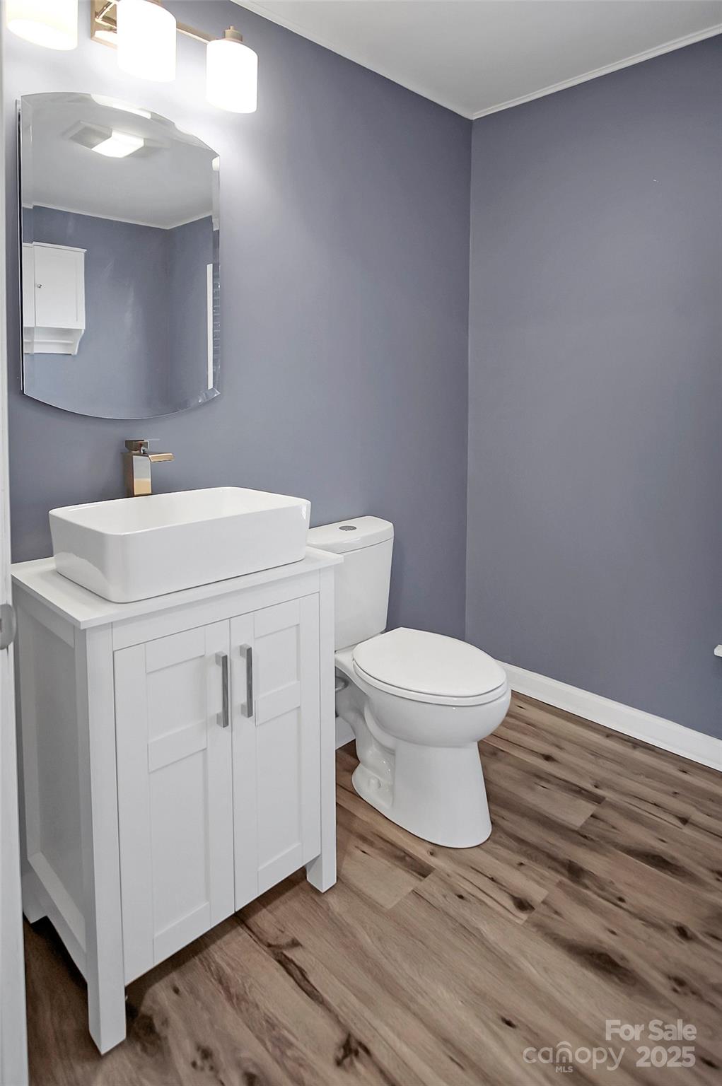 1925 Montclair Avenue Gastonia, NC 28054 - Photo 26 of 35 a white toilet sitting next to a bathroom sink