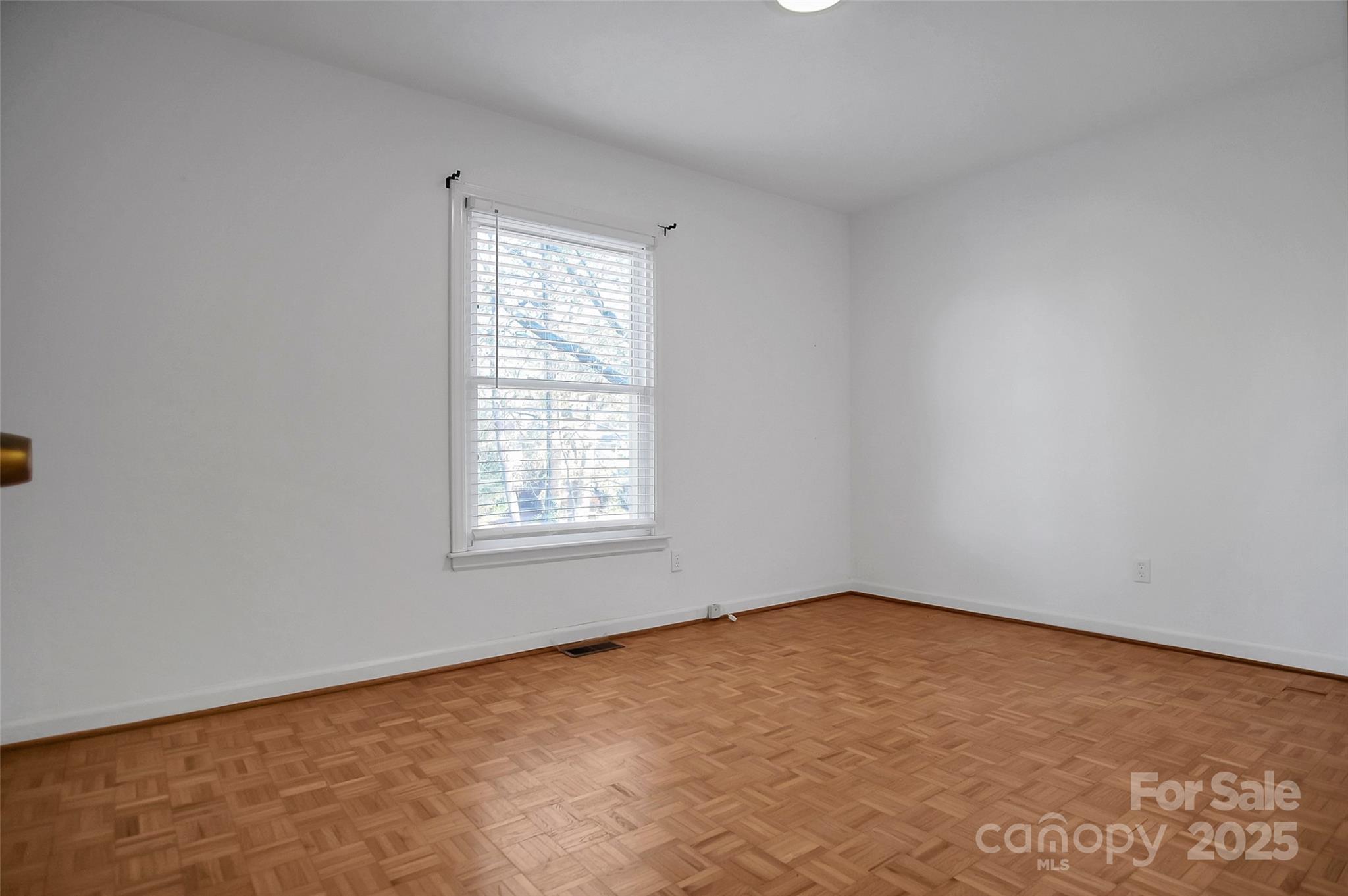 1925 Montclair Avenue Gastonia, NC 28054 - Photo 28 of 35 an empty room with a window
