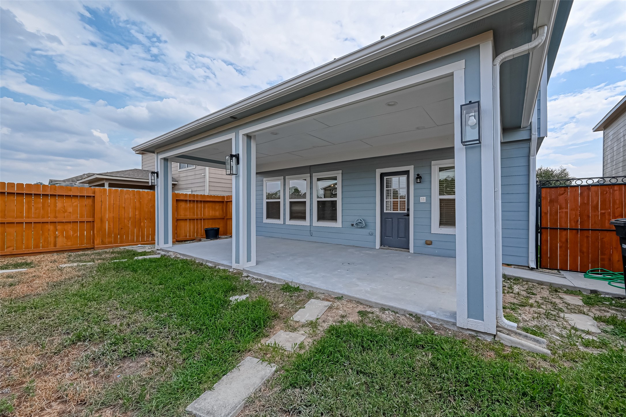6906 Anson Point Lane Houston, TX 77040 - Photo 27 of 31 a view of front of house with a yard
