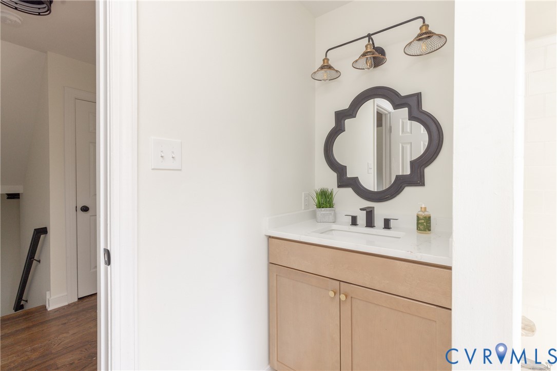 12532 Eagle Ridge Road Henrico, VA 23233 - Photo 47 of 68 Vanity with light wood-finish cabinetry, white cou