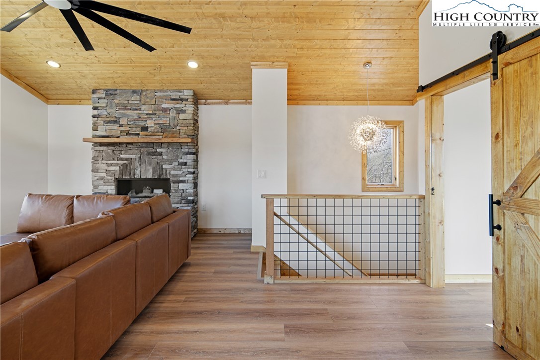 330 Maplewood Circle Boone, NC 28607 - Photo 14 of 44 a living room with furniture and a fireplace