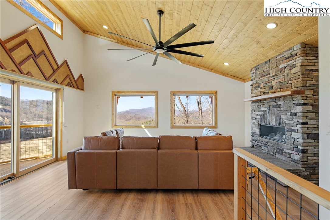 330 Maplewood Circle Boone, NC 28607 - Photo 17 of 44 a living room with furniture and a fireplace