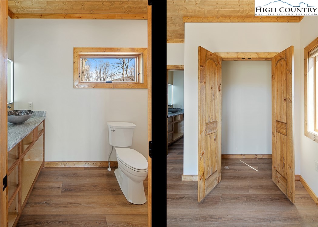 330 Maplewood Circle Boone, NC 28607 - Photo 22 of 44 a view of a bathroom with wooden floor and a toilet