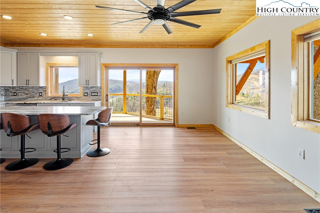 330 Maplewood Circle Boone, NC 28607 - Photo 3 of 44 a view of a livingroom with furniture window and wooden floor