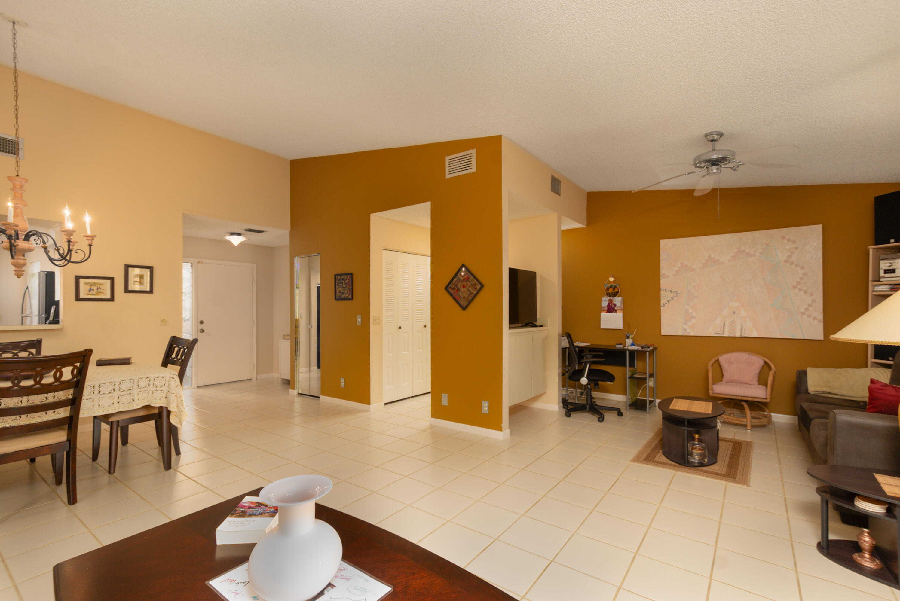 10867 Waterberry Court Boca Raton, FL 33498 - Photo 12 of 30 a living room with furniture and a table