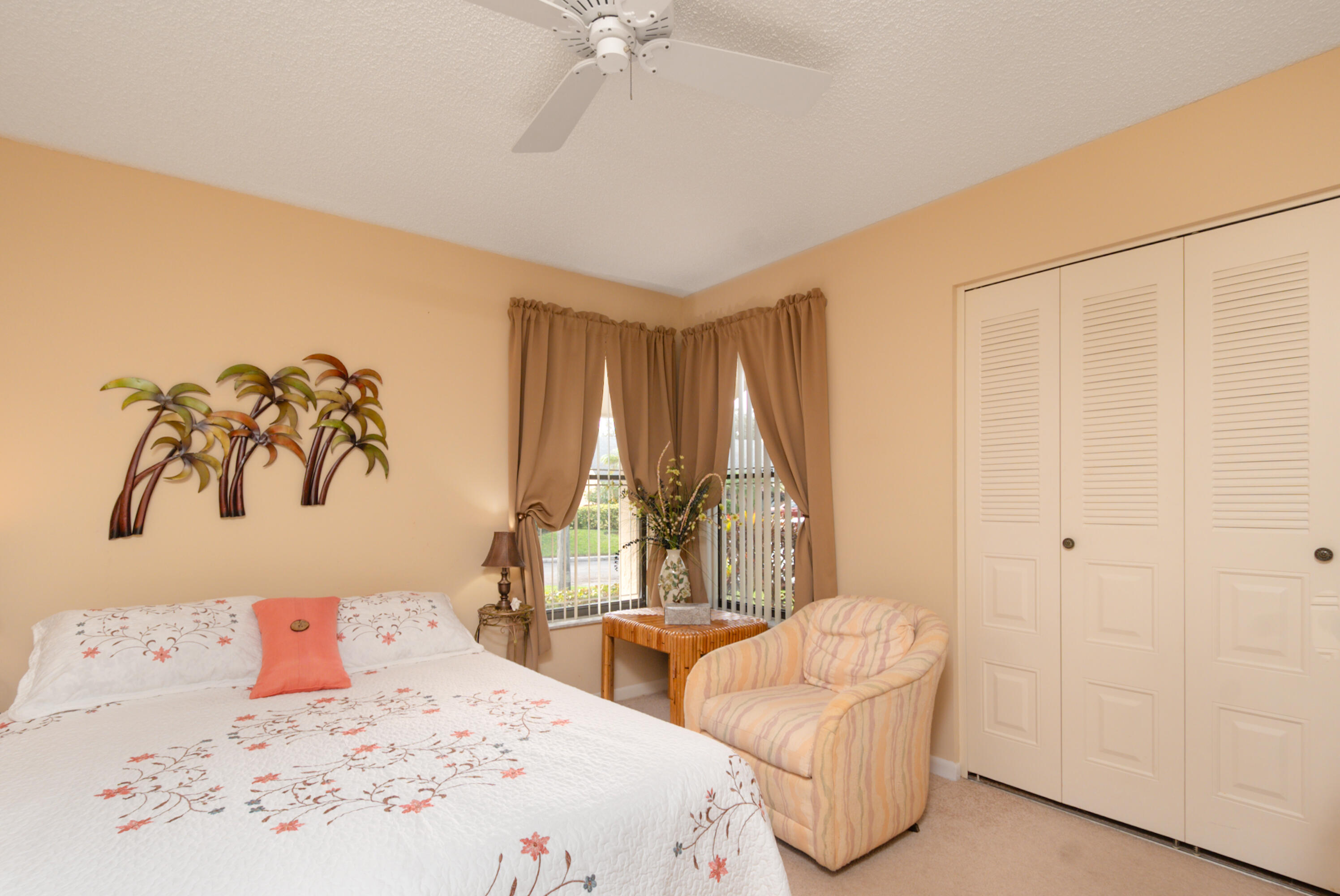 10867 Waterberry Court Boca Raton, FL 33498 - Photo 16 of 30 a bedroom with two beds and painted walls