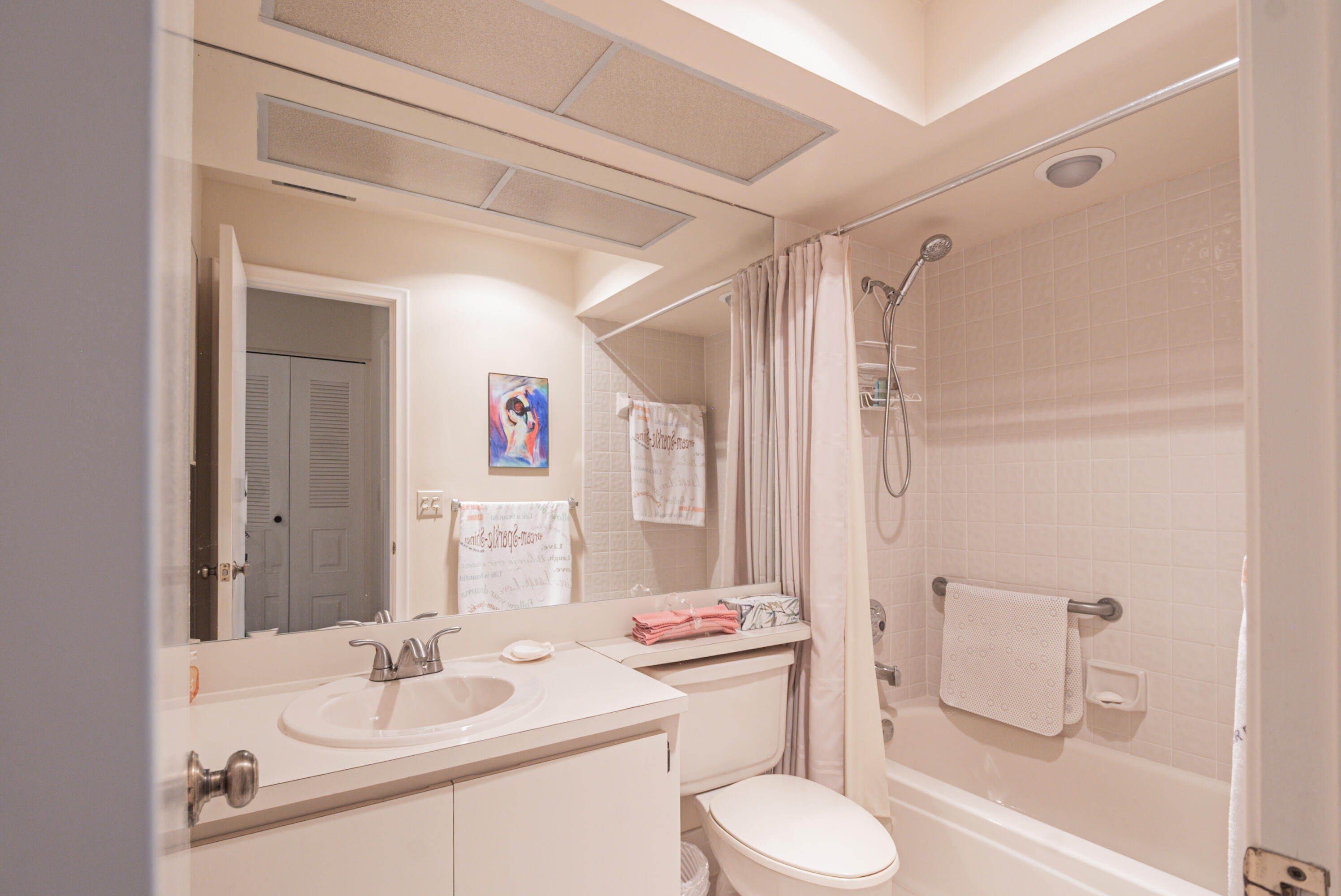 10867 Waterberry Court Boca Raton, FL 33498 - Photo 17 of 30 a bathroom with a sink toilet and shower