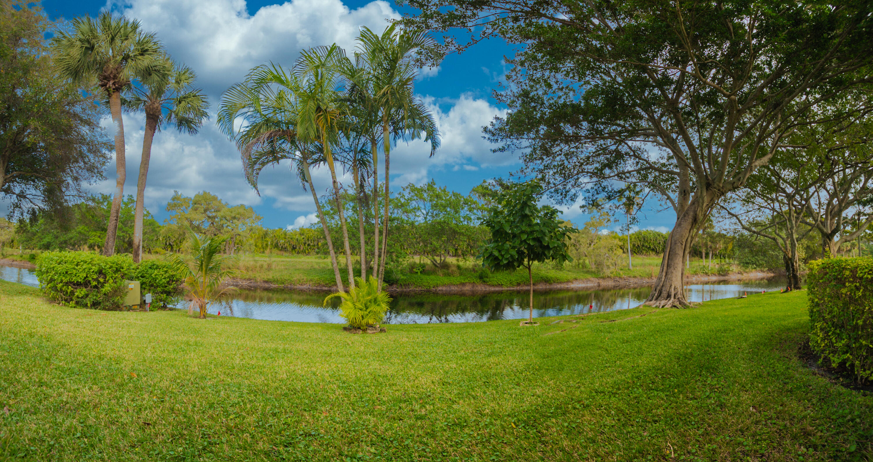 10867 Waterberry Court Boca Raton, FL 33498 - Photo 27 of 30 a view of an outdoor space and a yard