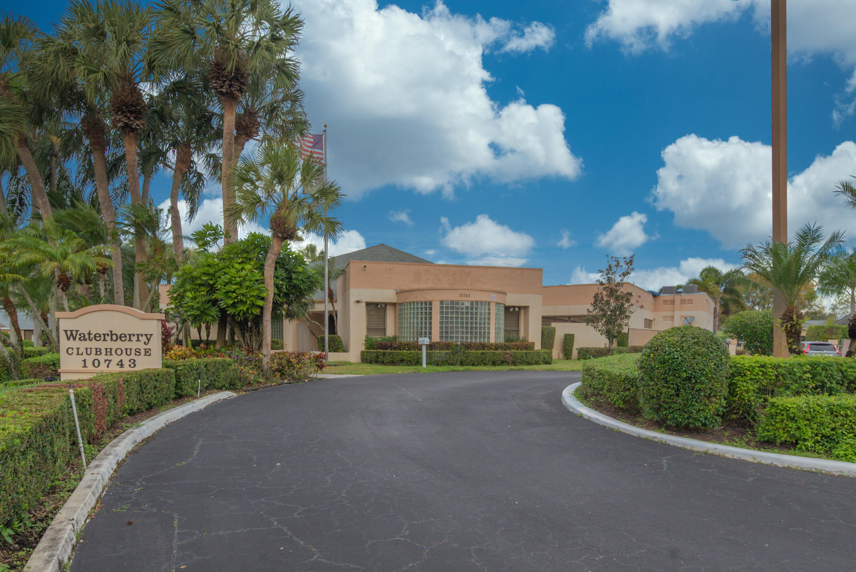 10867 Waterberry Court Boca Raton, FL 33498 - Photo 28 of 30 a view of a street with a building in the background