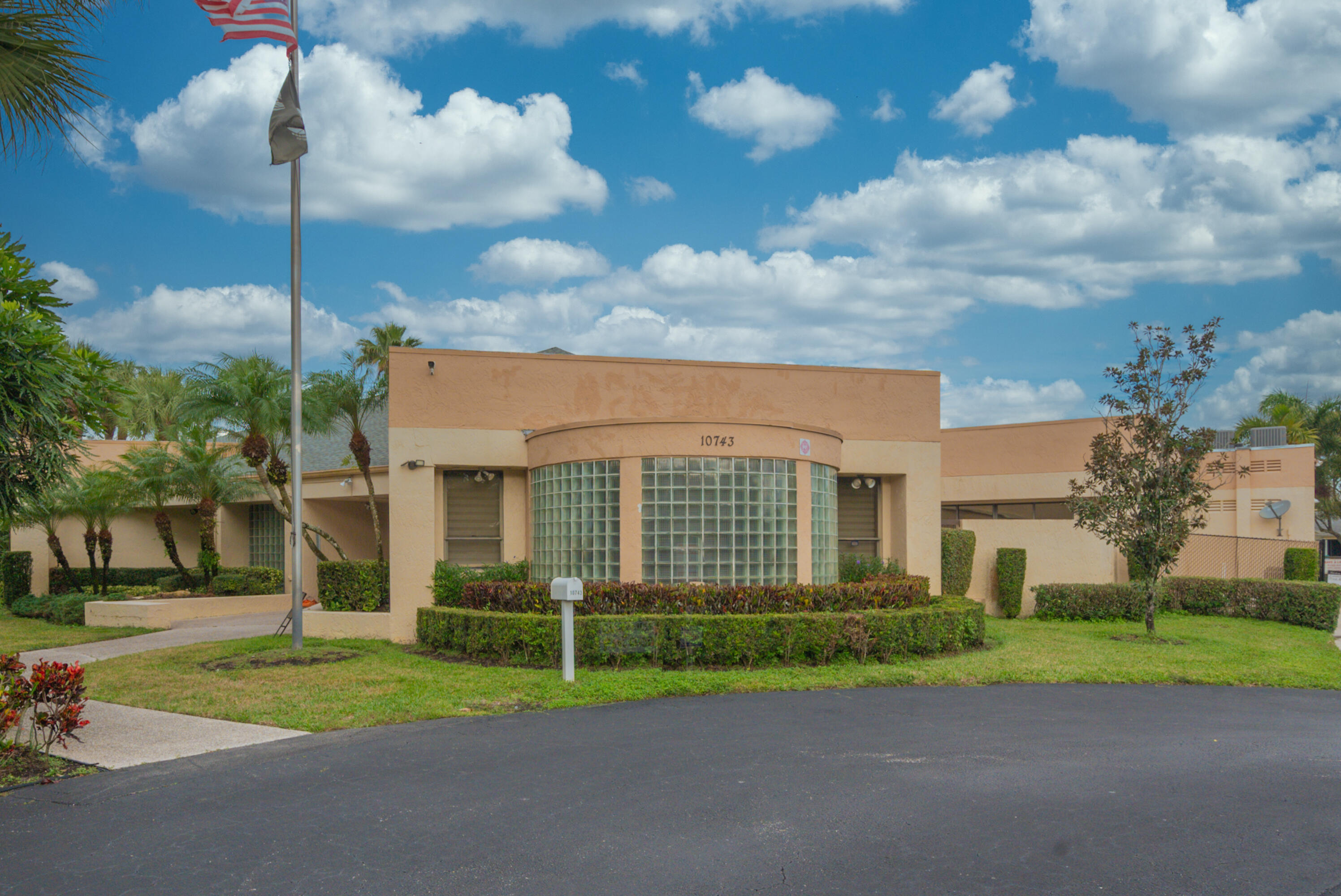 10867 Waterberry Court Boca Raton, FL 33498 - Photo 29 of 30 a view of a house with a yard and plants